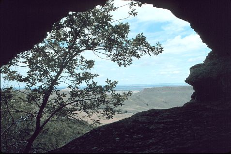 Photograph of entrance of Bear Cave from the back of the cave looking towards the town of New England